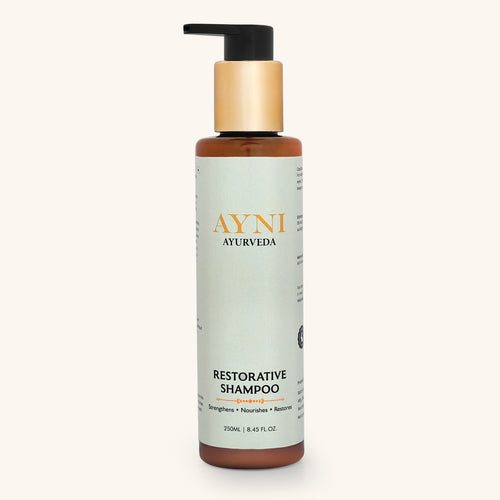 Ayni Ayurveda Restorative Shampoo bottle on a white background