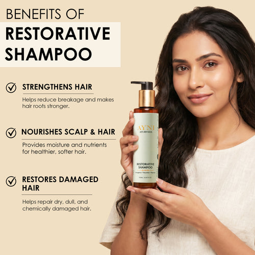 Woman holding a bottle of Avvi Restorative Shampoo with text listing benefits on a beige background