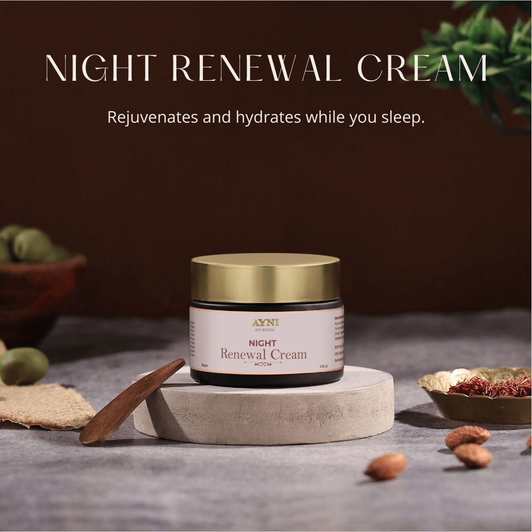 Night Renewal Cream jar on a wooden platform with natural elements in the background