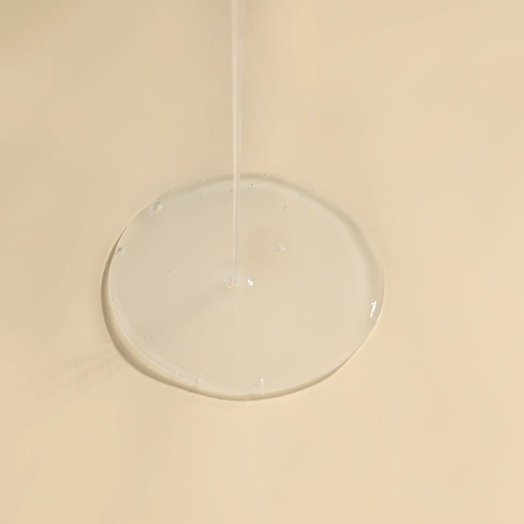Clear circular object on a beige background